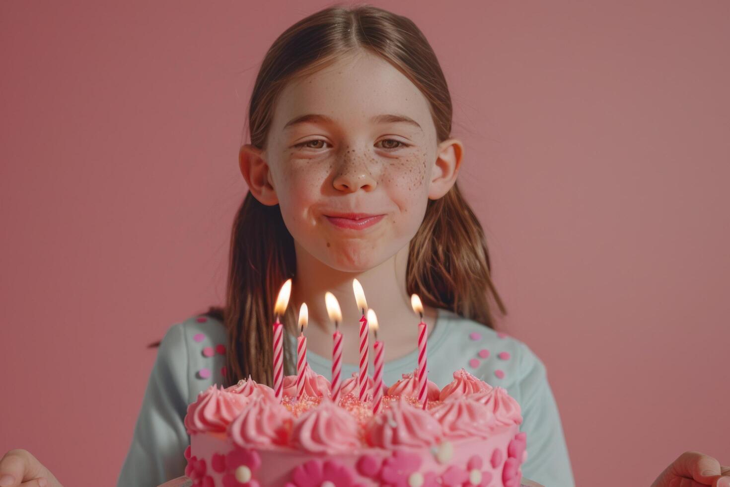 AI generated Happy dressed up ten year old girl blowing out candles on bright pink festive birthday cake photo