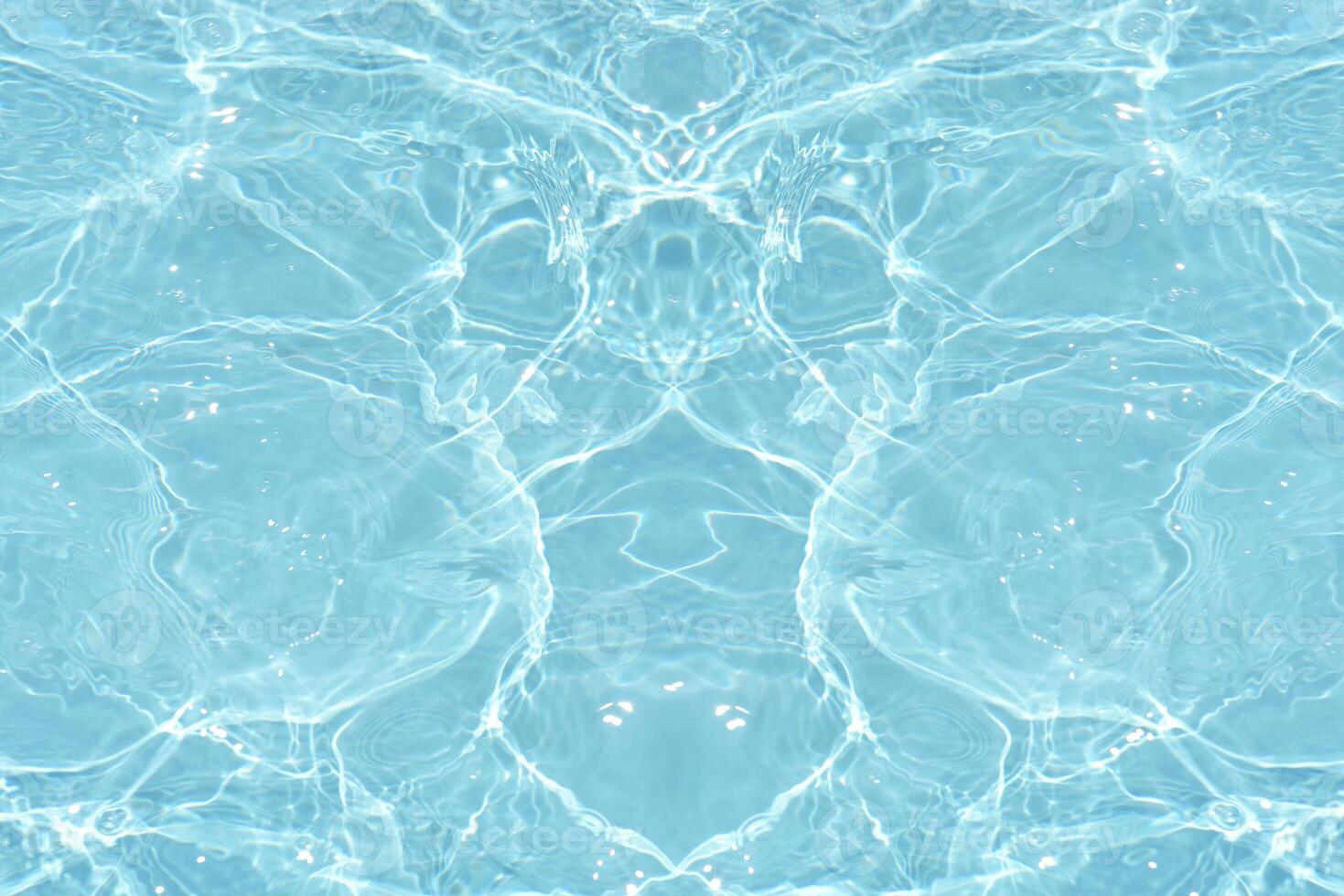 Bluewater waves on the surface ripples blurred. Defocus blurred transparent blue colored clear calm water surface texture with splash and bubbles. Water waves with shining pattern texture background. photo