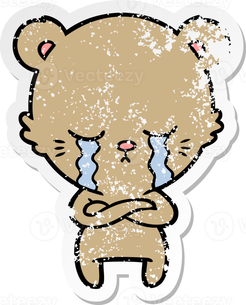 distressed sticker of a crying cartoon bear with folded arms png