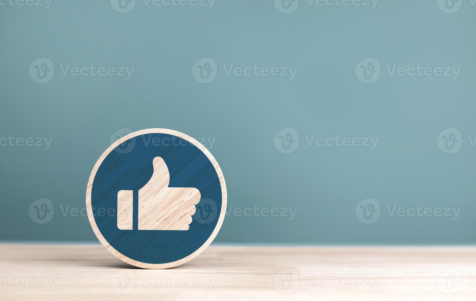 Thumbs up on circle wood plank, good job, Approval or support concept. with copy space photo