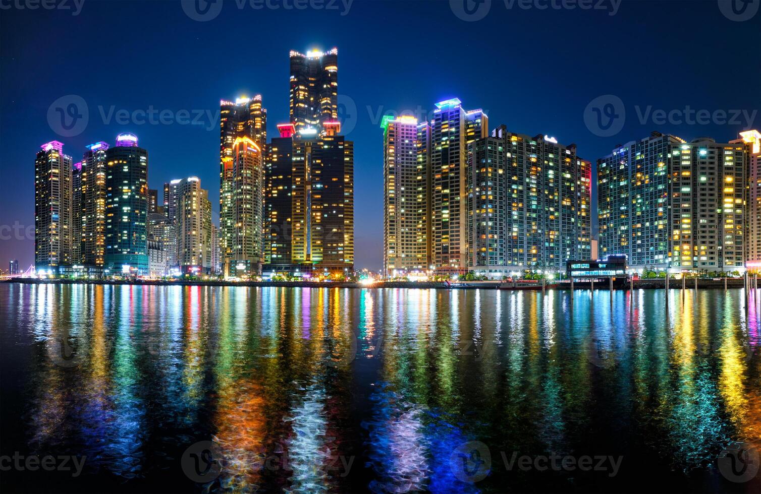 Busan Marina city skyscrapers illluminated in night photo