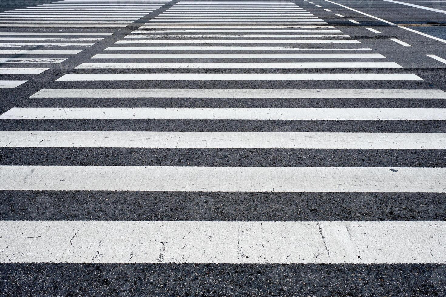 Crosswalk pedestrian crossing in the street photo