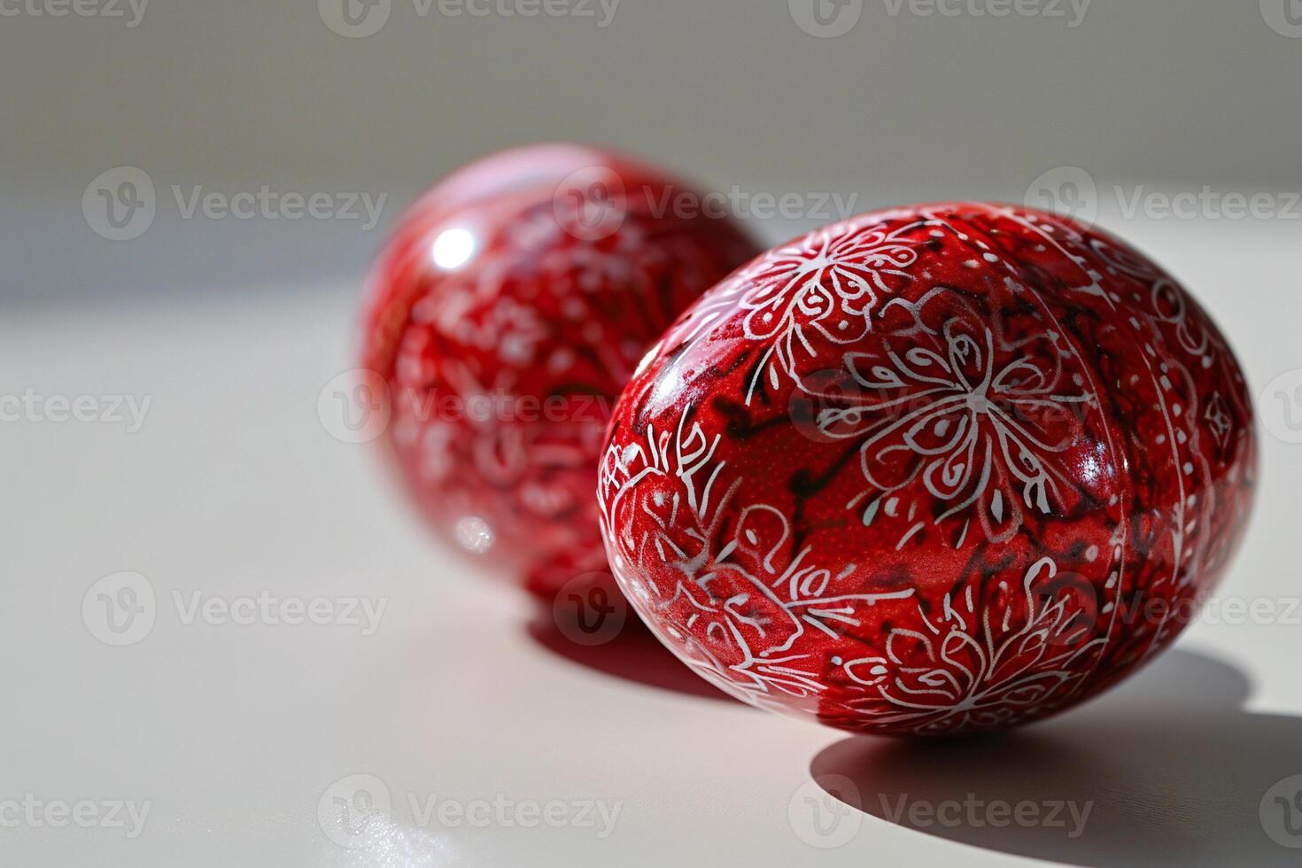 AI generated Two red Easter eggs with a painted pattern on a white background close-up. Generative AI photo