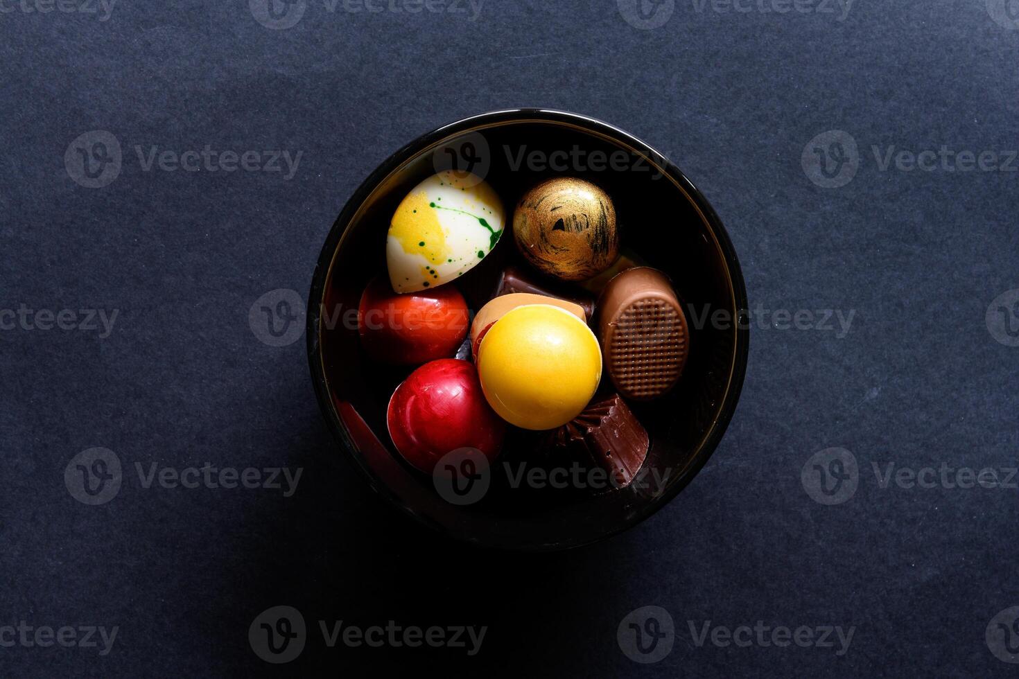 Small round bowl with delicious homemade chocolate in it photo