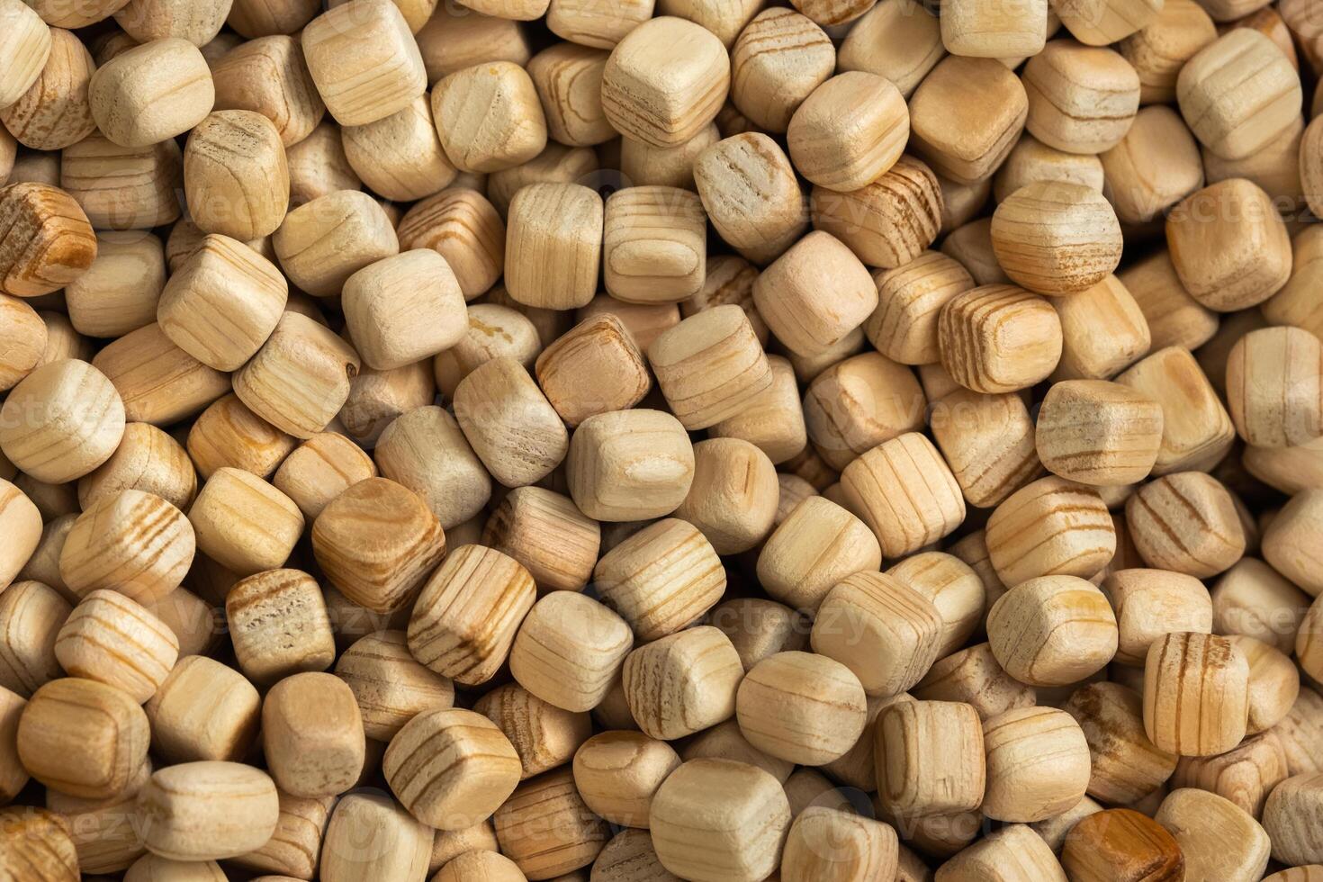 Lots of small wooden cubes. Background of wooden cubes photo