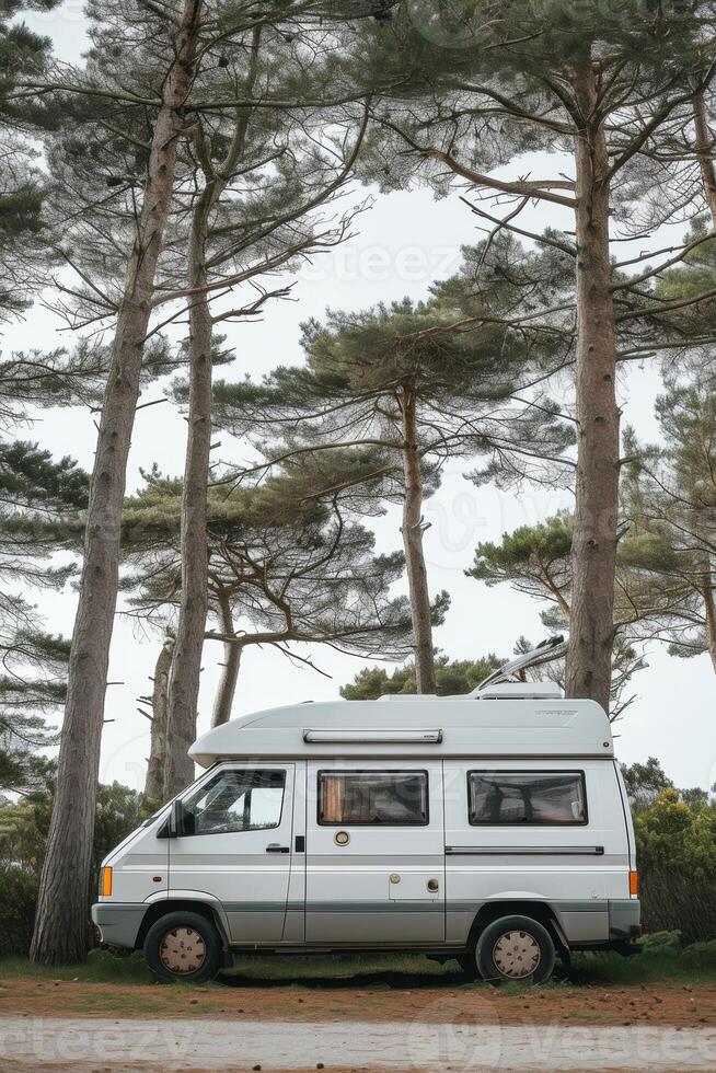 AI generated Camping in the forest of the motorhome . Holidays in a camper van photo