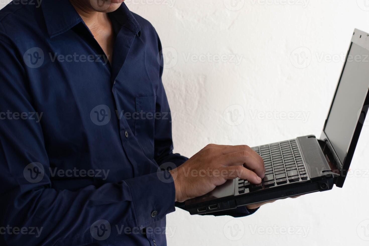 man working on laptop computer photo