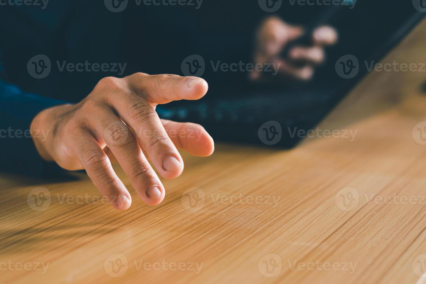 Photo of business people's hands working