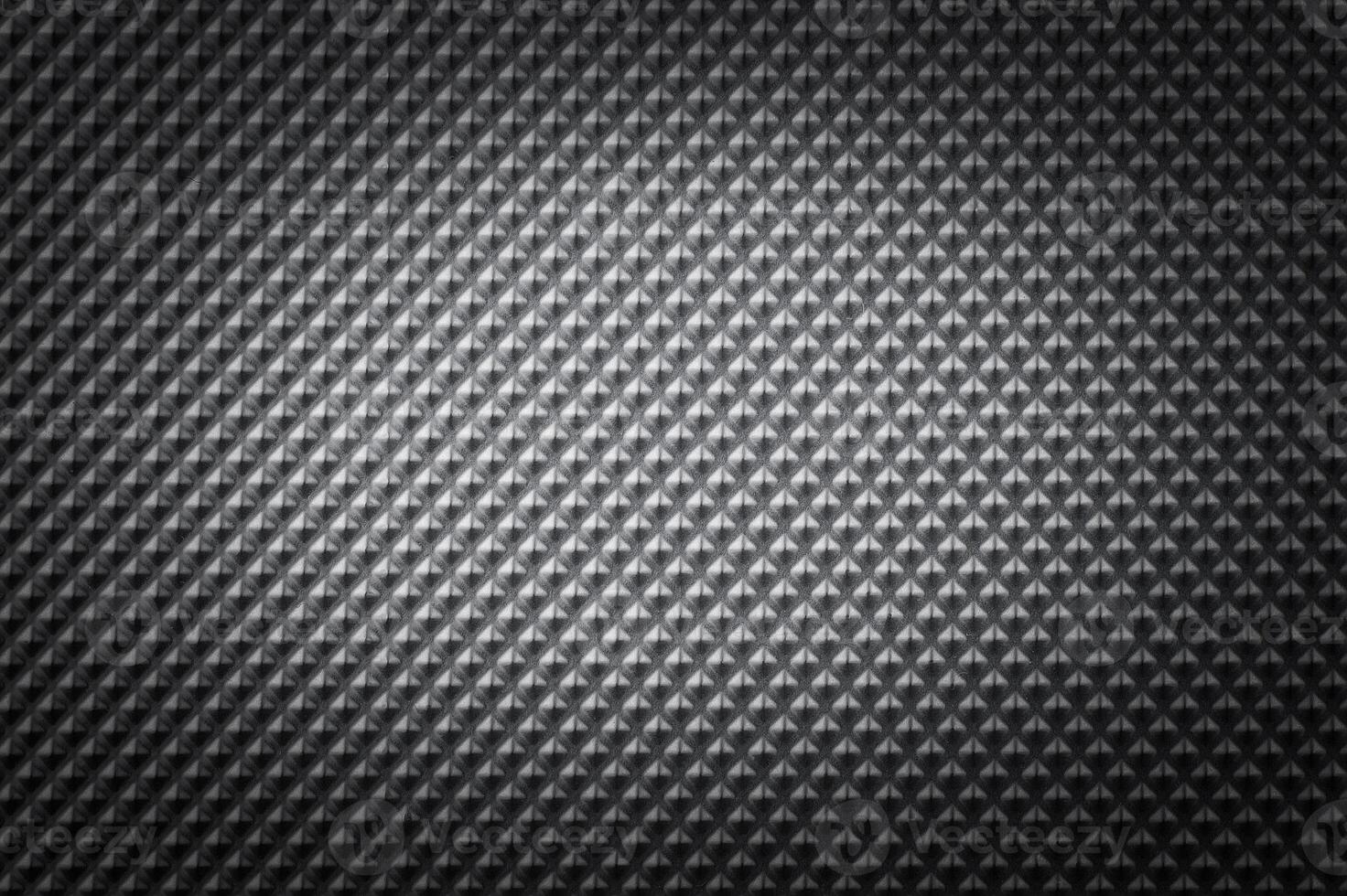 Background of metal with repetitive pattern photo