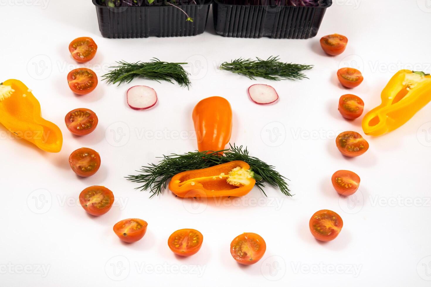 A person s face made of vegetables on a white background photo