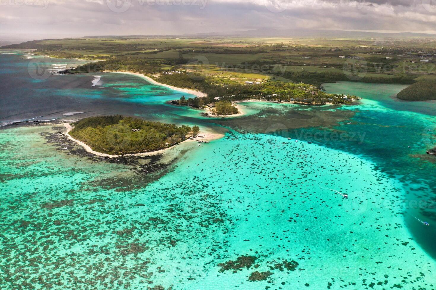 View from the height of the east coast of the island of Mauritius in the Indian Ocean. Beautiful lagoon of the island of Mauritius, photo