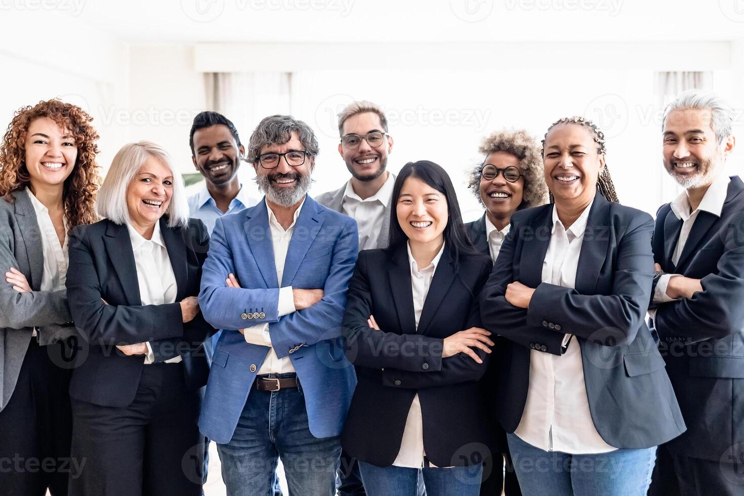Business team of multiracial people standing in front of camera during meeting work photo