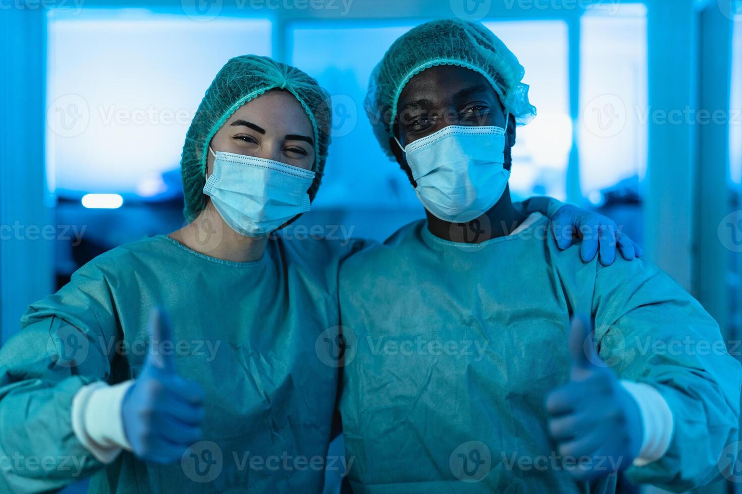 Doctors wearing personal protective equipment fighting against corona virus outbreak - Health care and medical workers concept photo