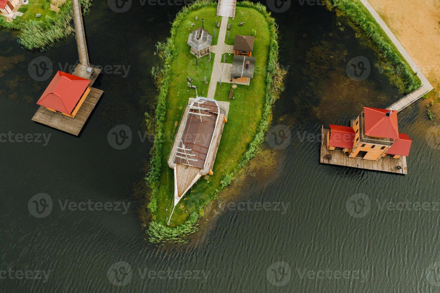 view from the height of the Lake in a green field in the form of a horseshoe and a village in the Mogilev region.Belarus.The Nature Of Belarus photo