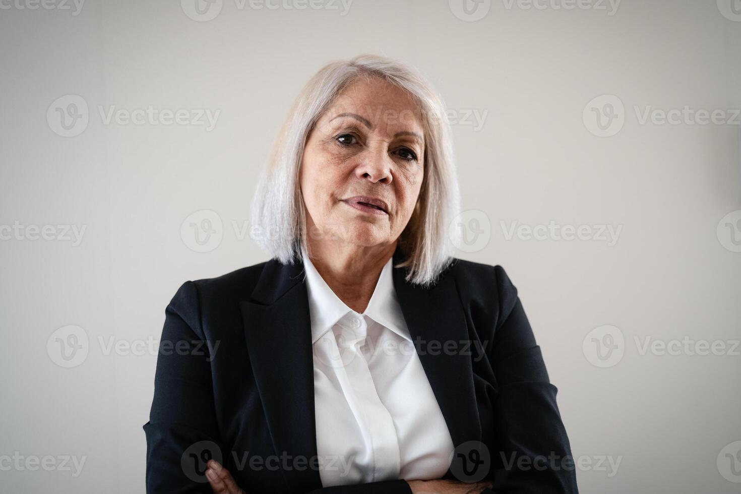 Senior business woman looking in camera photo