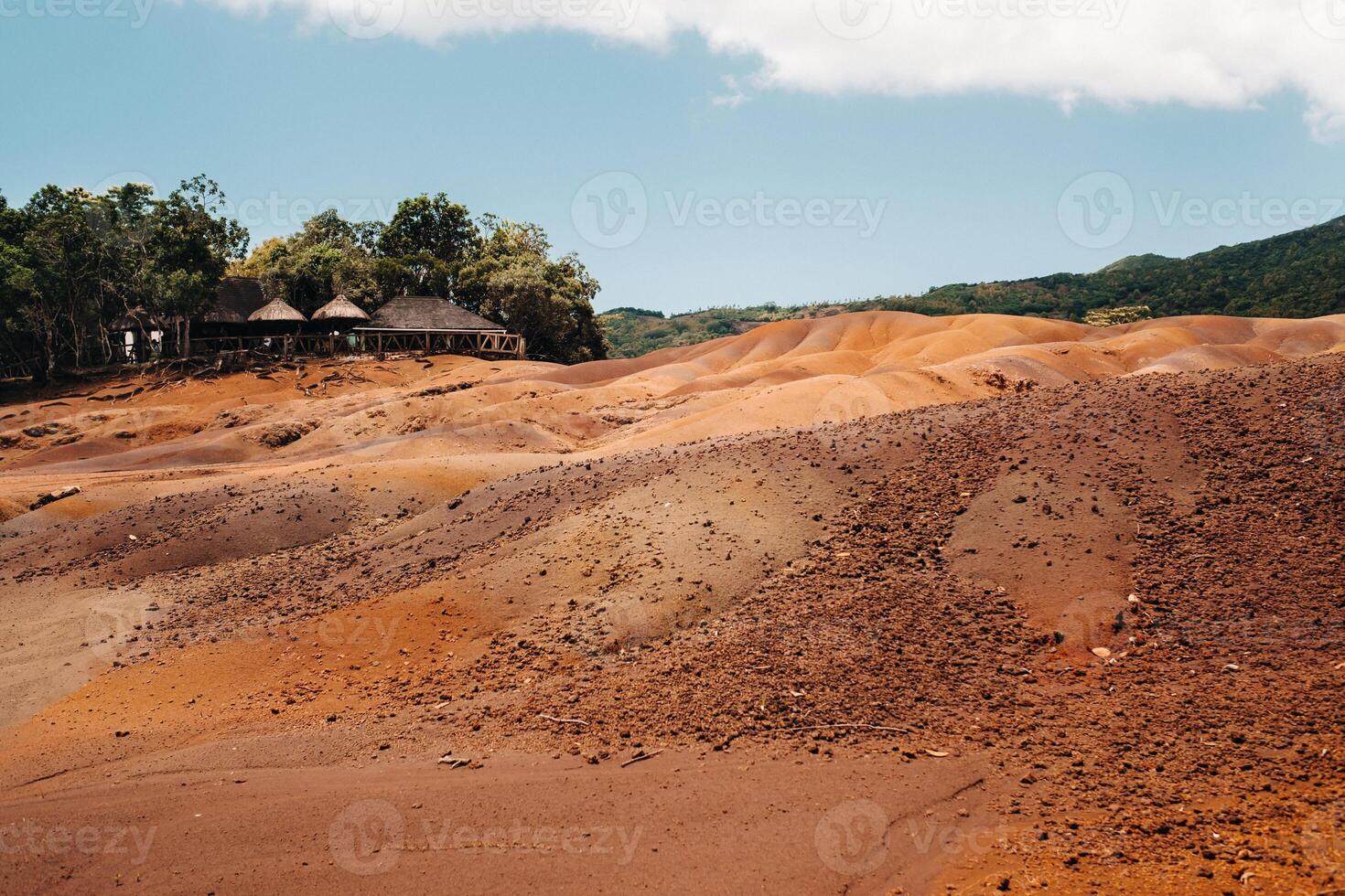 Seven colored earths in Mauritius, nature reserve, Chamarel. The green forest is behind us.Mauritius island photo