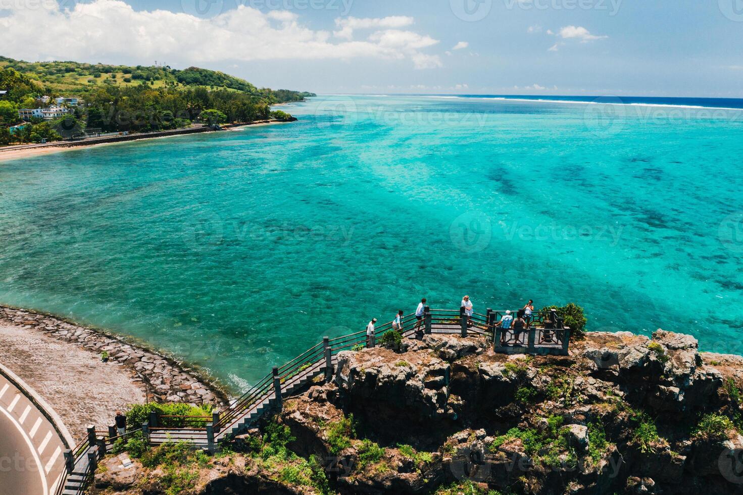 Maconde view point.Monument to captain Matthew Flinders in Mauritius. An unusual road to the Islands of Mauritius. Coral reef in the Indian ocean photo