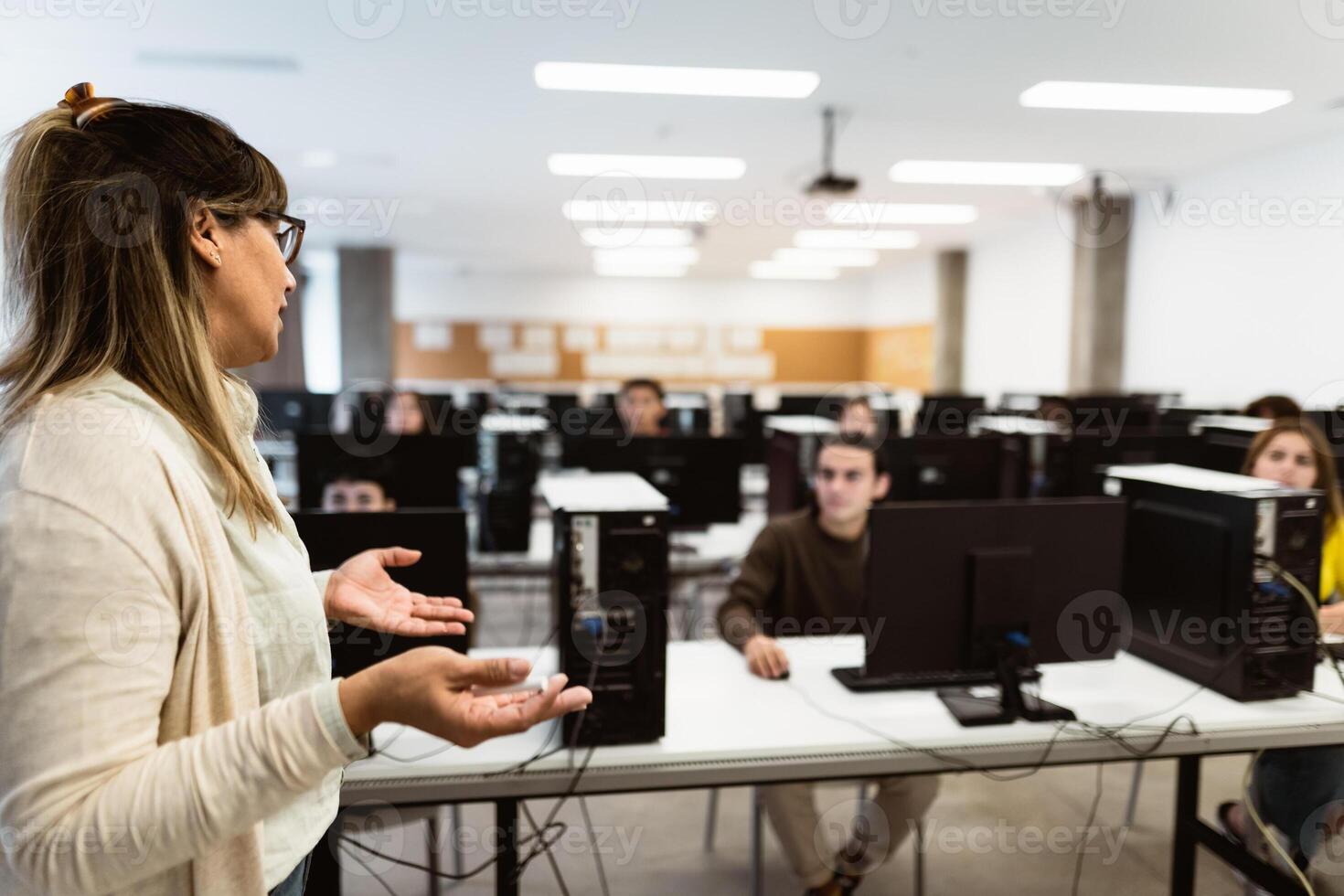 Hispanic teacher doing lecture in high school - Education concept photo