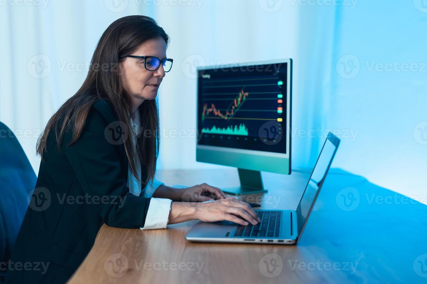 Business trader woman working on crypto currency markets with blockchain technology - Decentralized finance and stock exchange concept photo