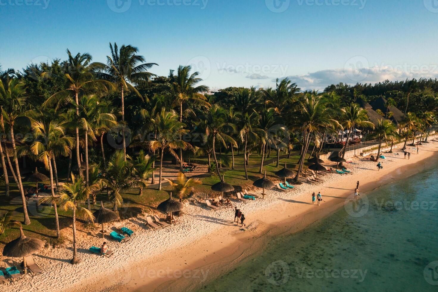 On the beautiful beach of the island of Mauritius along the coast. Shooting from a bird's eye view of the island of Mauritius. photo