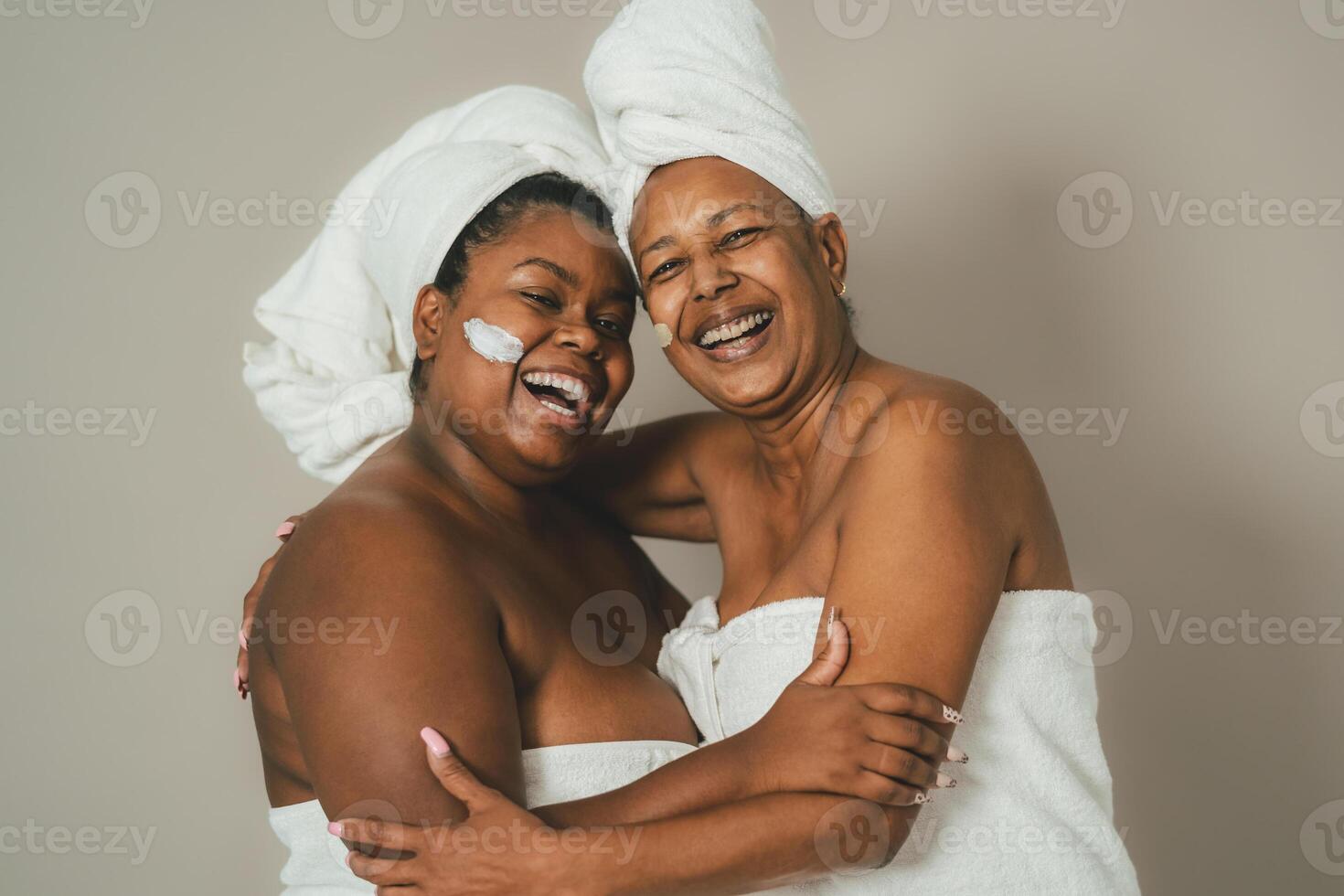 Happy African multigenerational women having skin care spa day - People wellness lifestyle concept photo