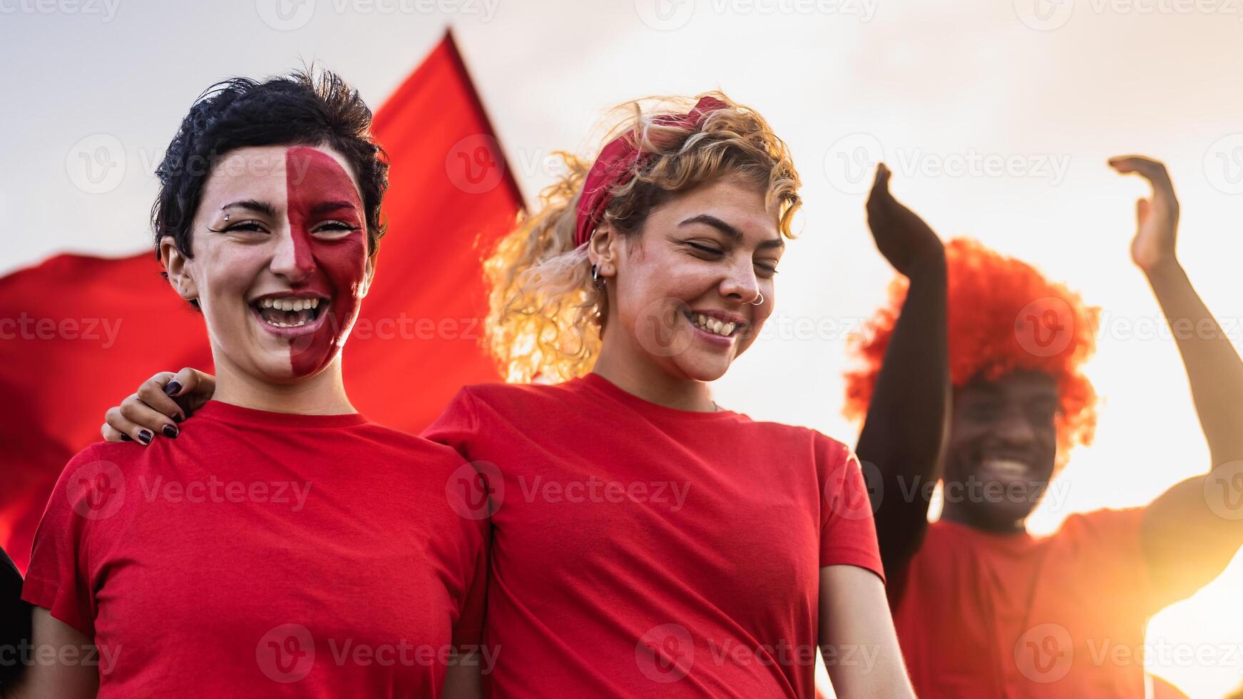 Football fans having fun cheering their favorite team - Soccer sport entertainment concept photo