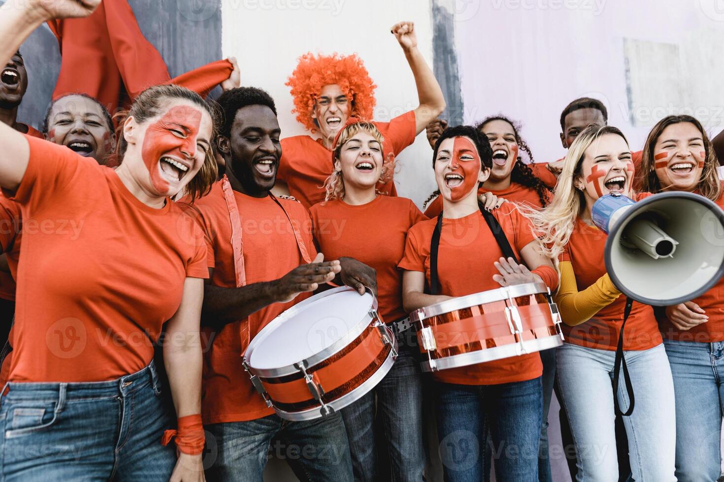 Football fans having fun supporting favorite team - Soccer sport entertainment concept photo