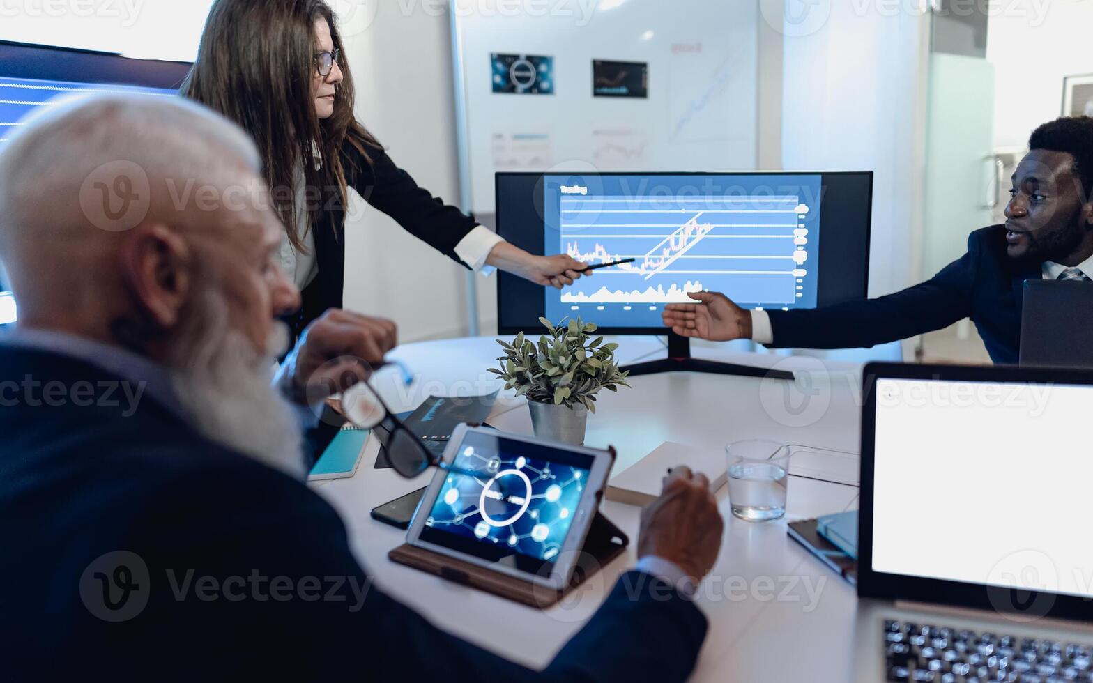 Business traders people in meeting room working on crypto currency markets with blockchain technology - Decentralized finance and stock exchange concept photo