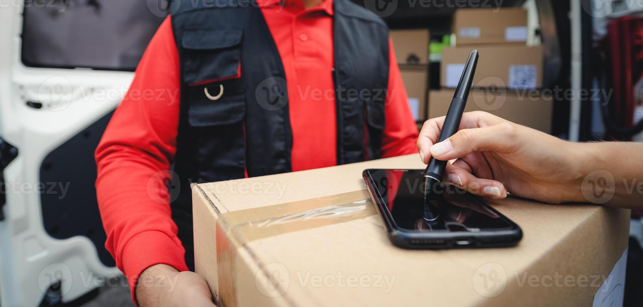 Express courier delivering cardboard box order to customer - Deliver and online buying concept photo