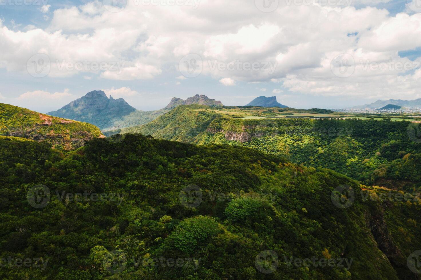Mountain Landscape of the gorge on the island of Mauritius, Green mountains of the jungle of Mauritius photo