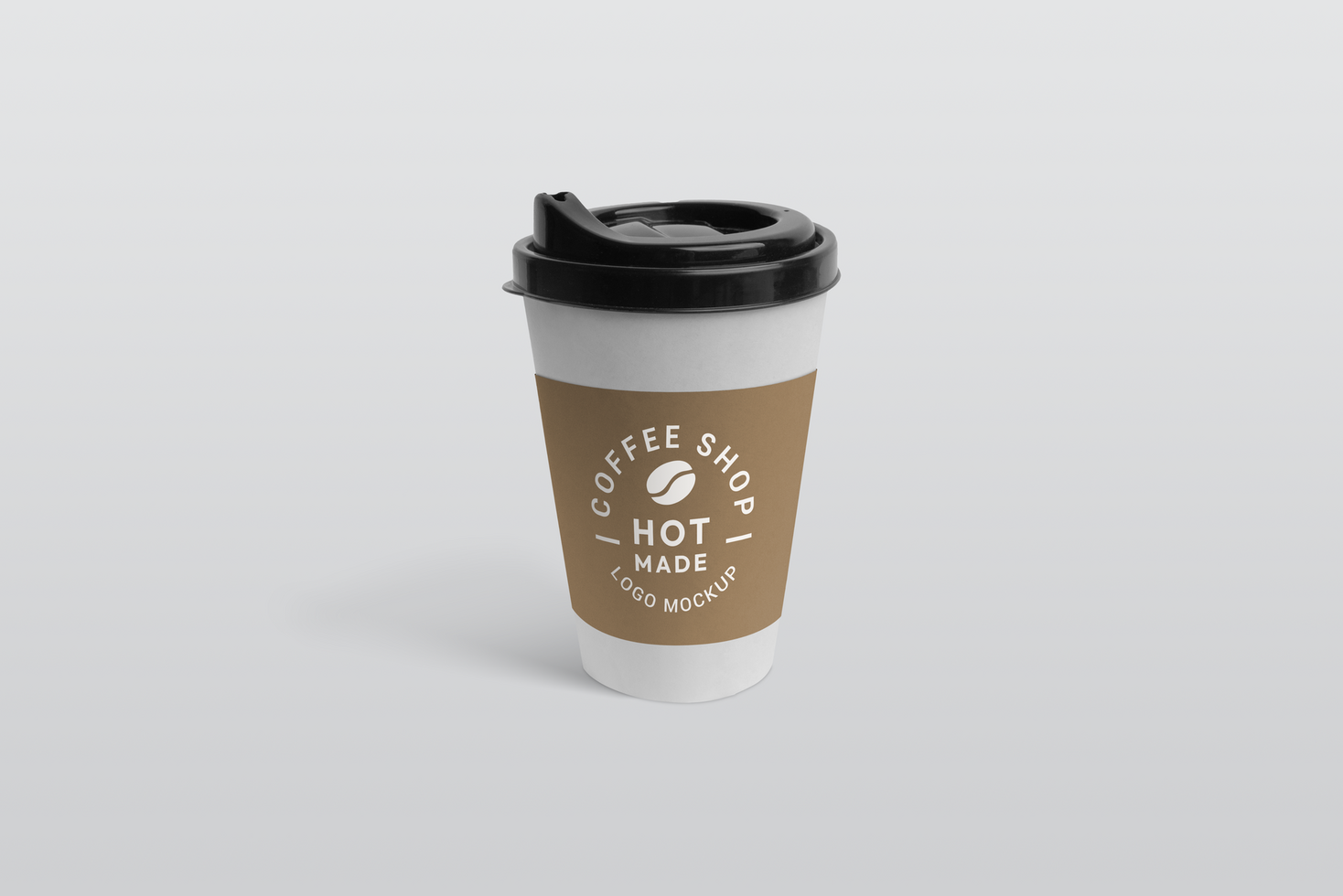Coffee-to-go cup with logo mockup on white separated background psd