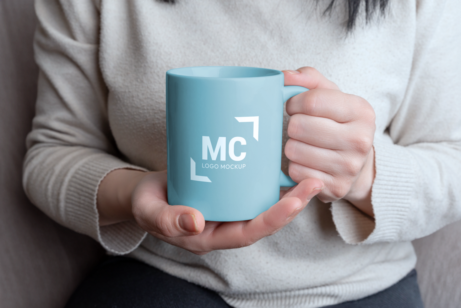 Mug with changeable colors and logo mockups held by female hands psd
