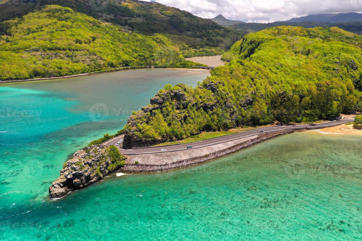 Maconde view point.Monument to captain Matthew Flinders in Mauritius. An unusual road to the Islands of Mauritius. Coral reef in the Indian ocean photo
