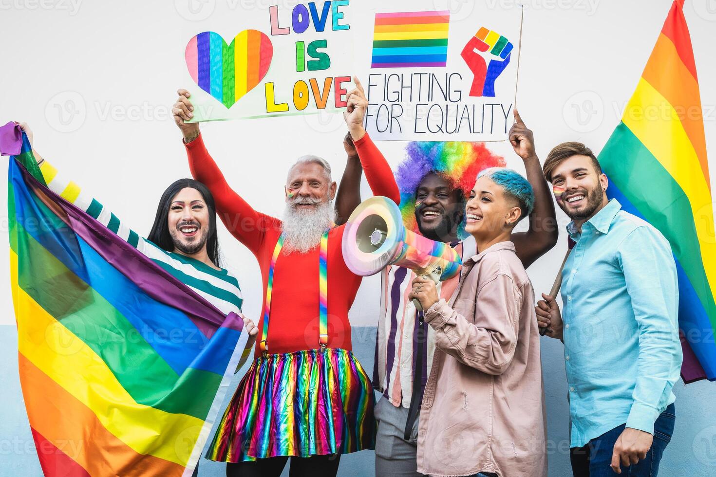 Happy Multiracial people celebrating gay pride event - Group of friends with different age and race having fun during LGBT social event photo
