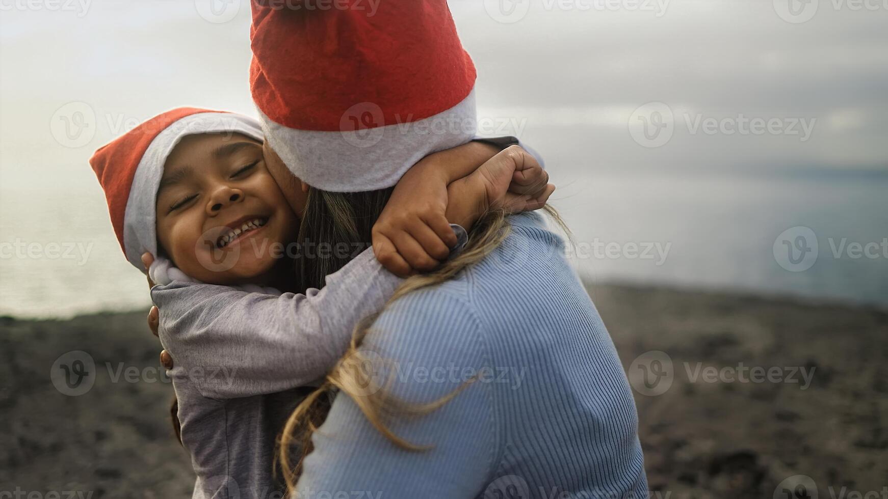 Happy Latin family enjoying Christmas holidays - Parenthood and holidays concept photo