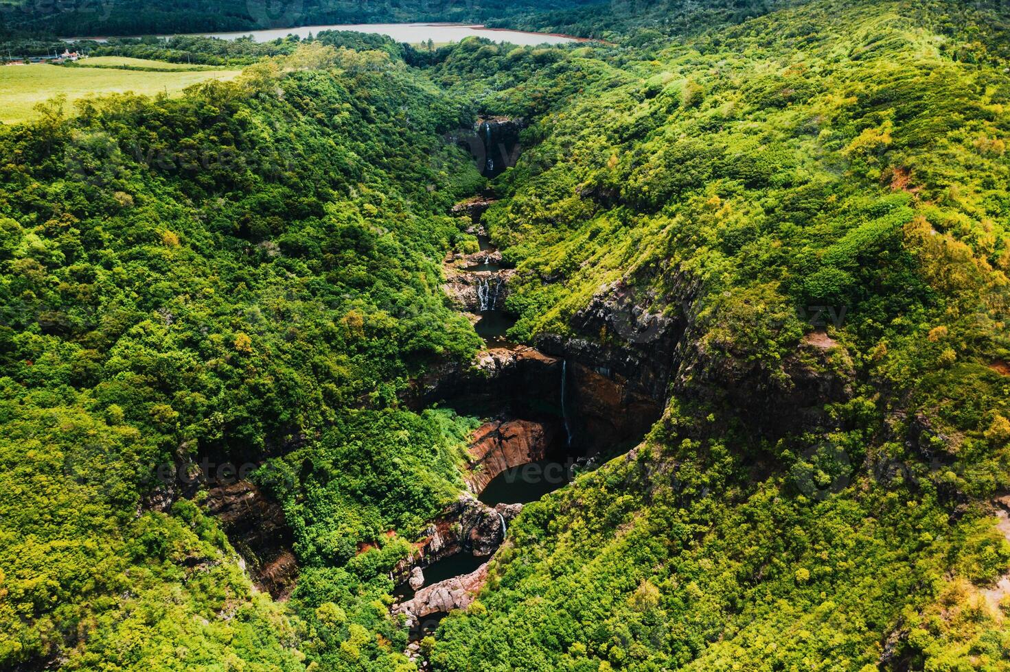 Aerial view from above of the Tamarin waterfall seven cascades in the tropical jungles of the island of Mauritius photo
