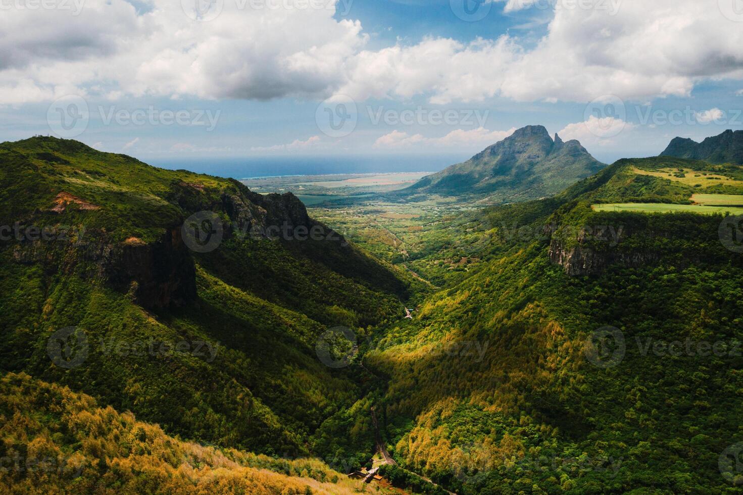 Mountain Landscape of the gorge on the island of Mauritius, Green mountains of the jungle of Mauritius photo