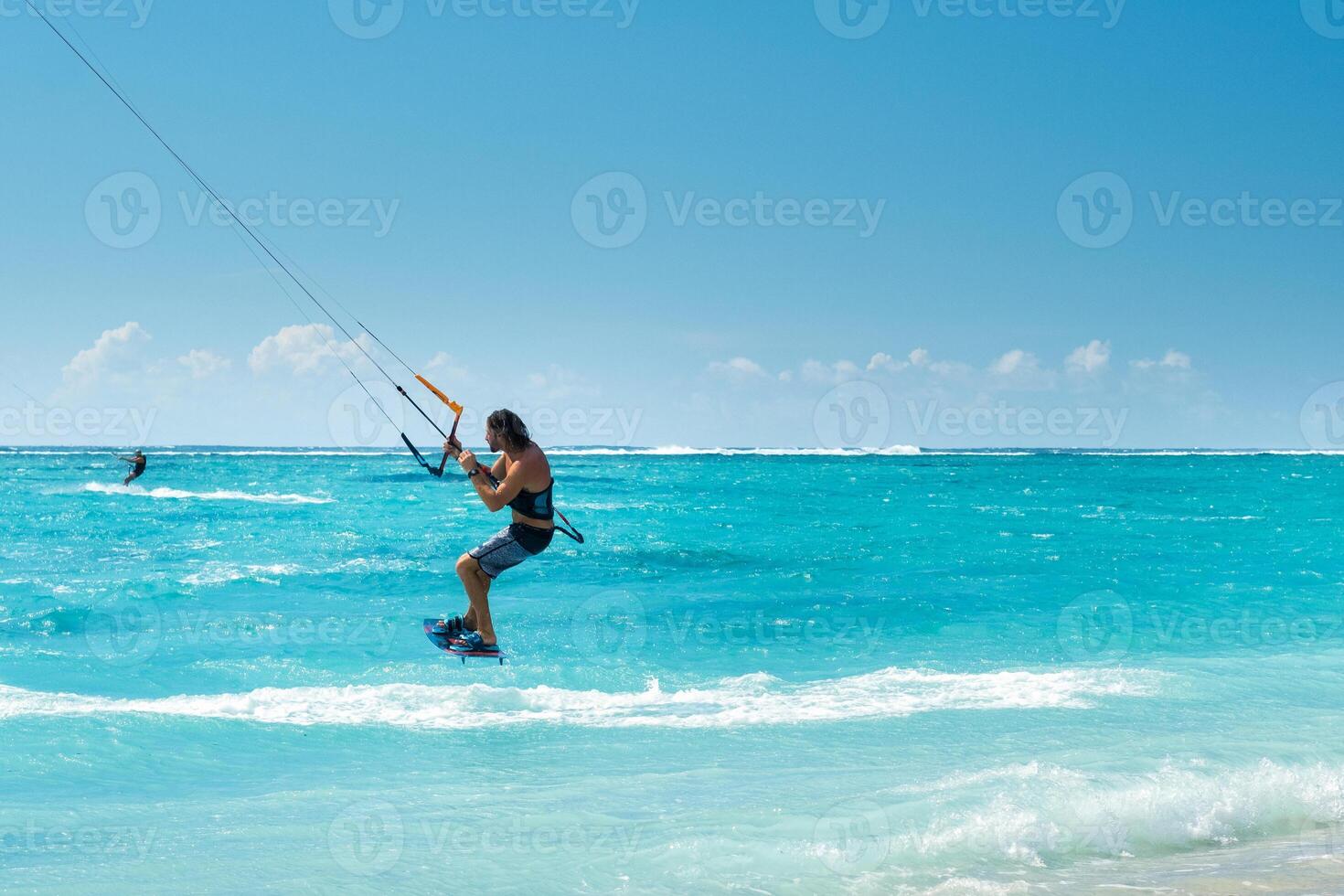 A man paragliding on Le Morne beach, Mauritius, Indian ocean on the island of Mauritius photo