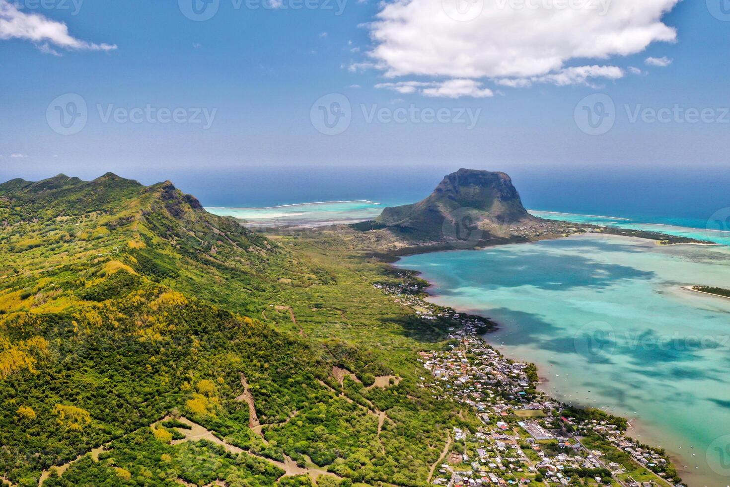 View from the height of the island of Mauritius in the Indian Ocean and the beach of Le Morne-Brabant photo
