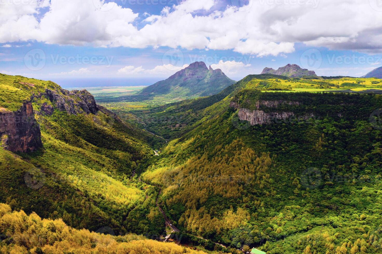 Mountain Landscape of the gorge on the island of Mauritius, Green mountains of the jungle of Mauritius photo