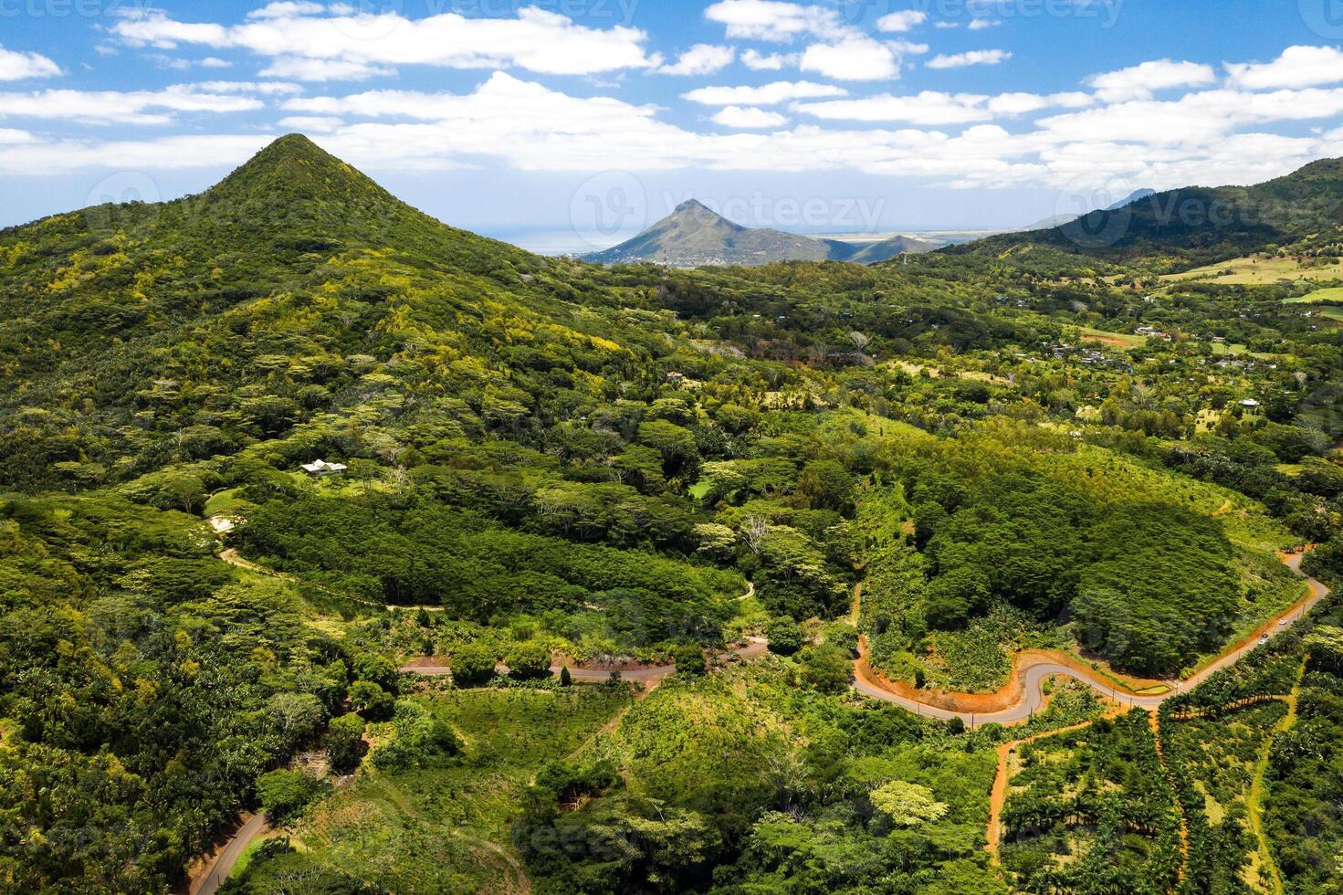 Bird's-eye view of the mountains and fields of the island of Mauritius.Landscapes Of Mauritius. photo