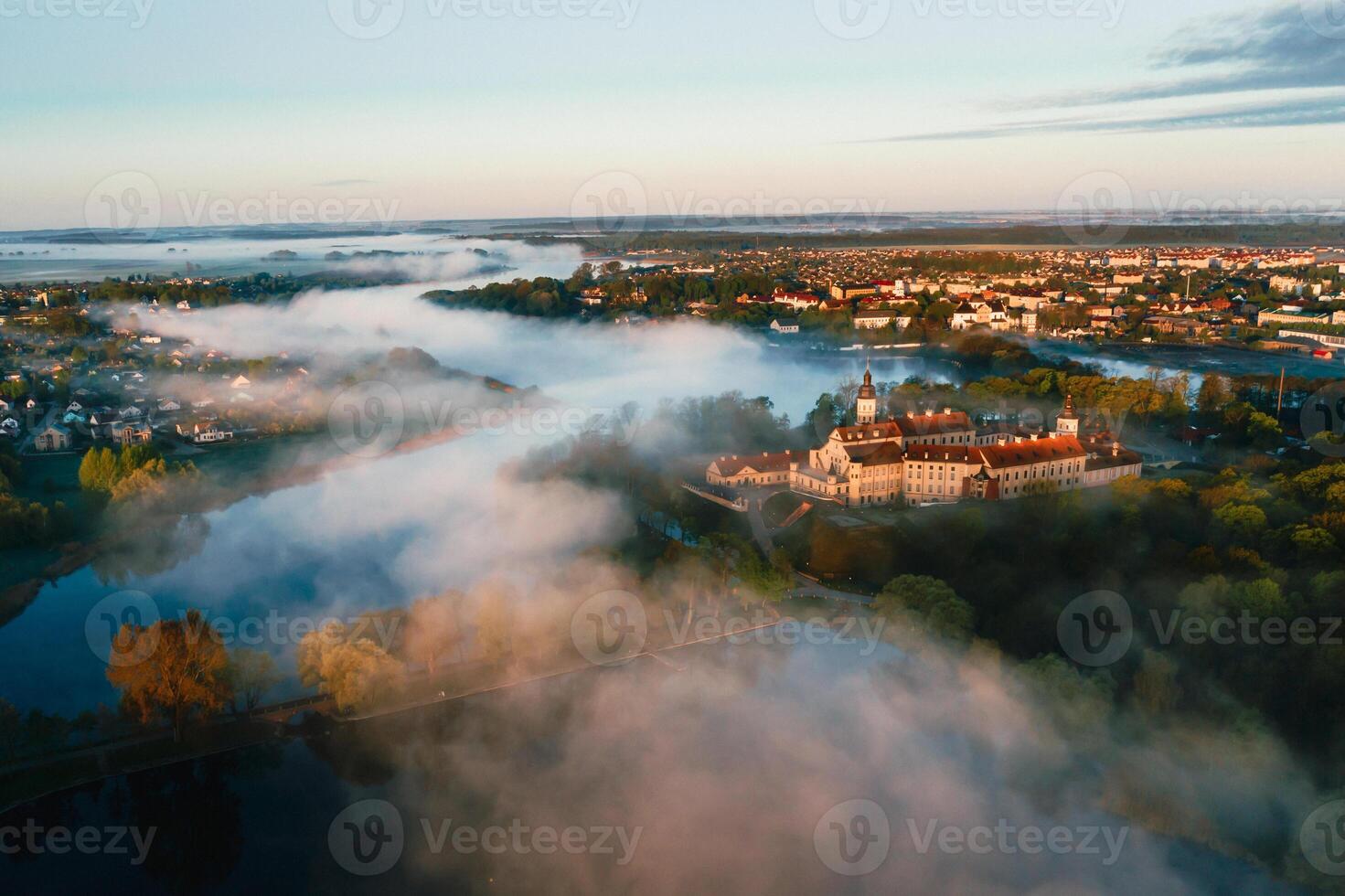 Nesvizh castle is a residential castle of the Radziwill family in Nesvizh, Belarus, with a beautiful view from above at dawn photo
