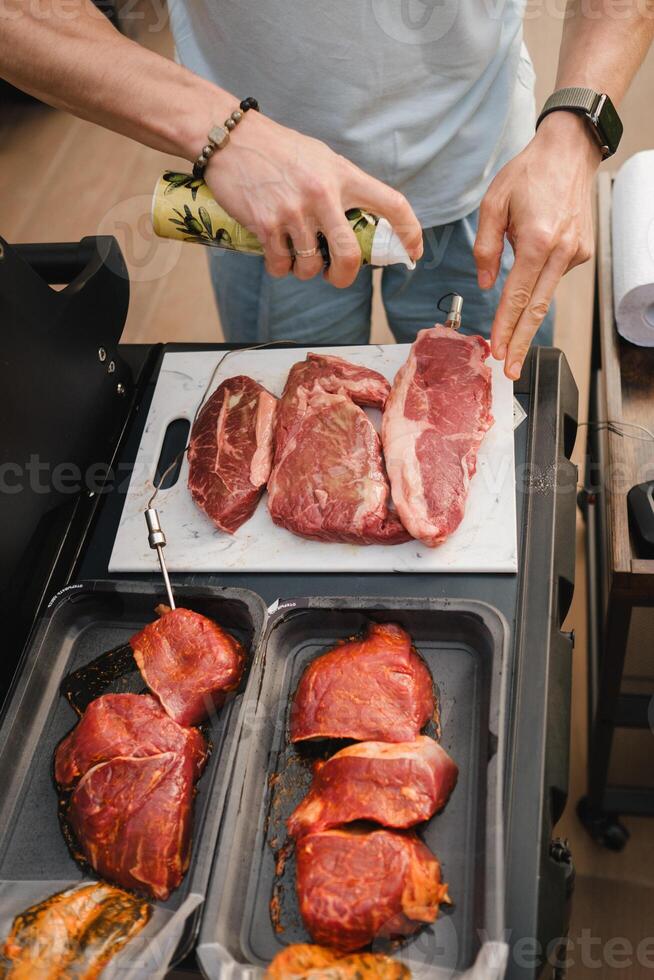 Preparation for Cooking meat on an open grill with temperature check photo