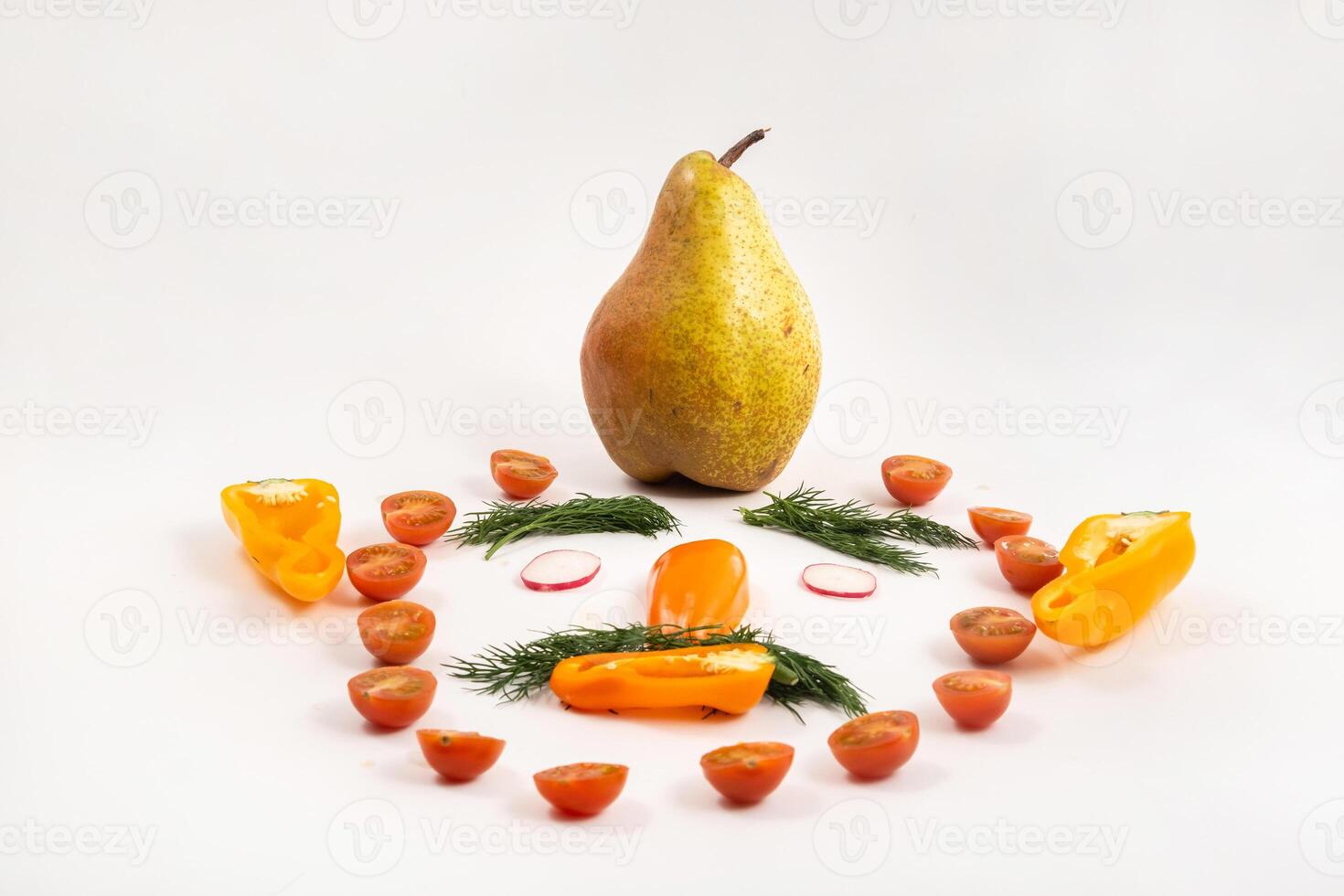 The face of a man made of sliced vegetables and a pear on his head on a white background photo