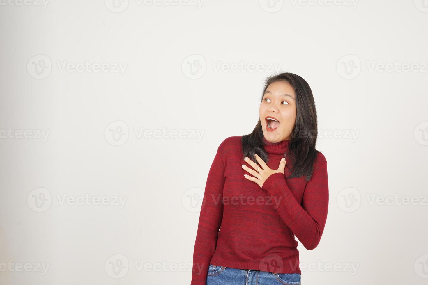 Young Asian woman in Red t-shirt doing Wow or Shock face and looking aside isolated on white background photo