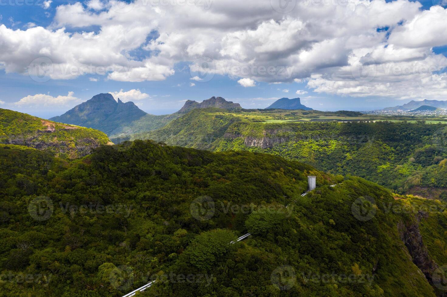 Mountain Landscape of the gorge on the island of Mauritius, Green mountains of the jungle of Mauritius photo