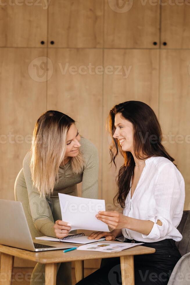 a girl after fitness classes discusses her healthy diet with a nutritionist photo