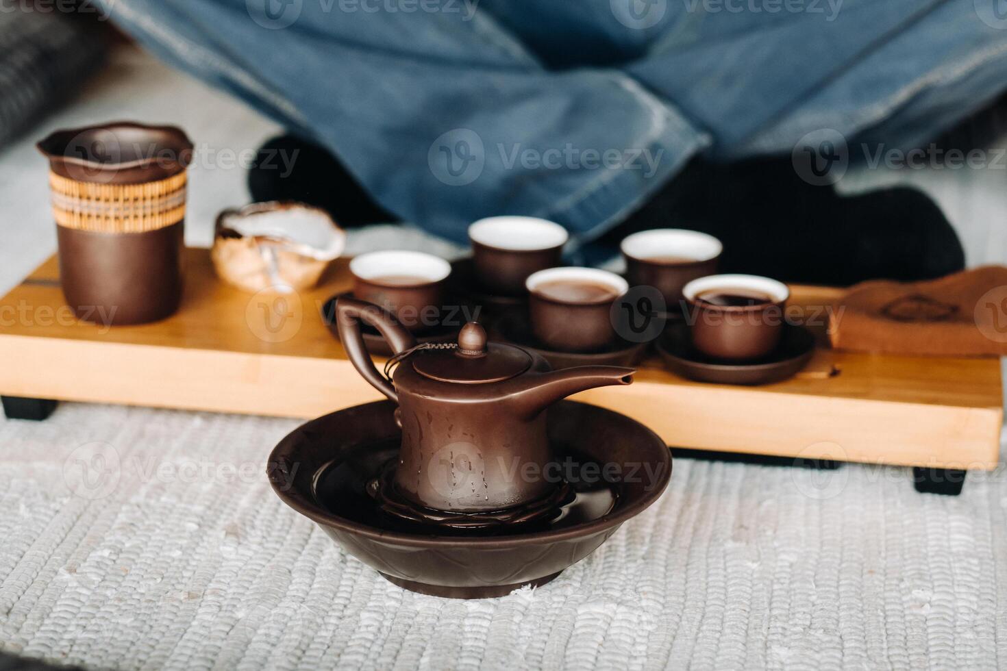 Preparing for a tea ceremony with a large company photo