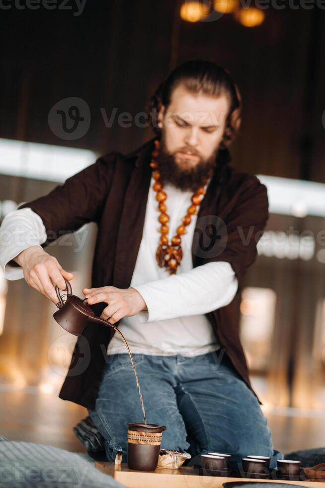 The tea master is preparing to hold a tea ceremony in the interior photo