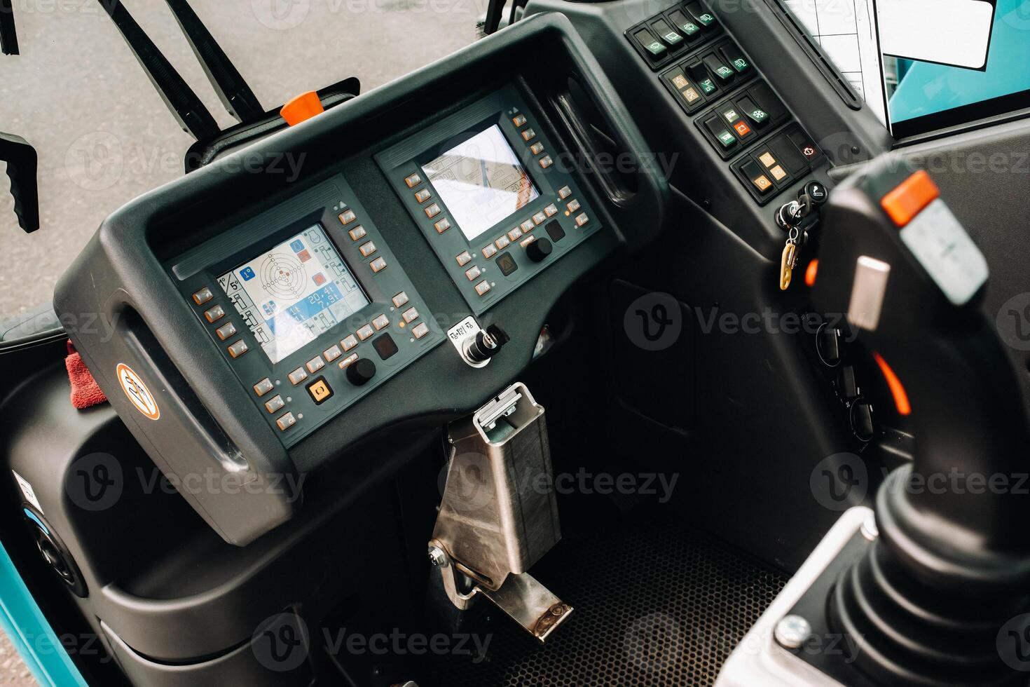 Crane control panel in the driver's cab of a car crane photo